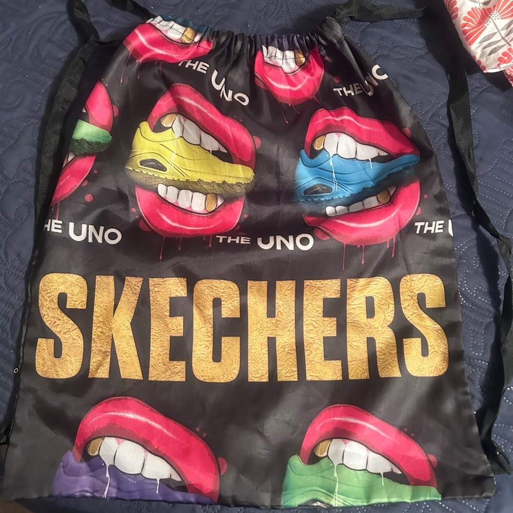Skechers Black Drawstring backpack Bag with Multicolor Lips & Gold Logo